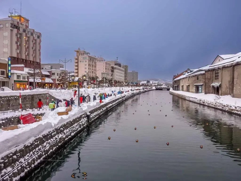 Lights coming on in Otaru canal in winter