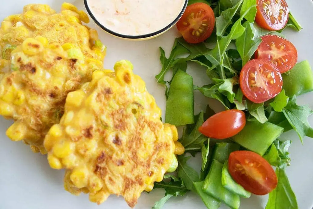 Sweet corn fritters with fresh herbs