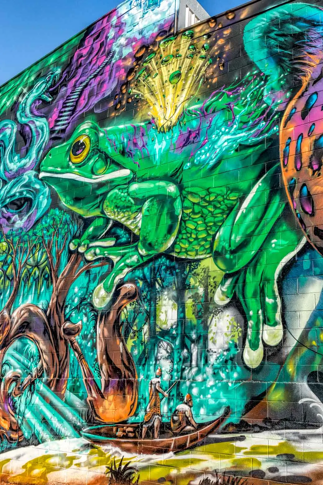 Street art of fantasy Amazon scene on brick building in Toowoomba