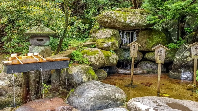 Triple springs of luck in Futarasan Shrine in Nikko