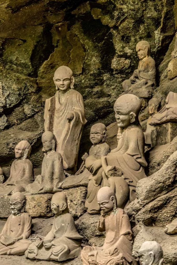 Some of the 1500 arhat statues on Mt Nokogiri in Japan