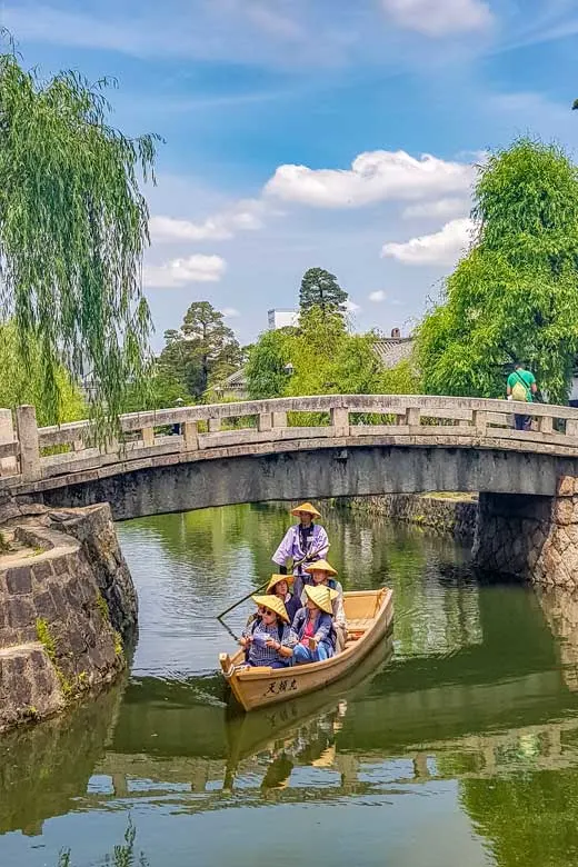 Traditional boat on the canal in Kurashiki Bikan