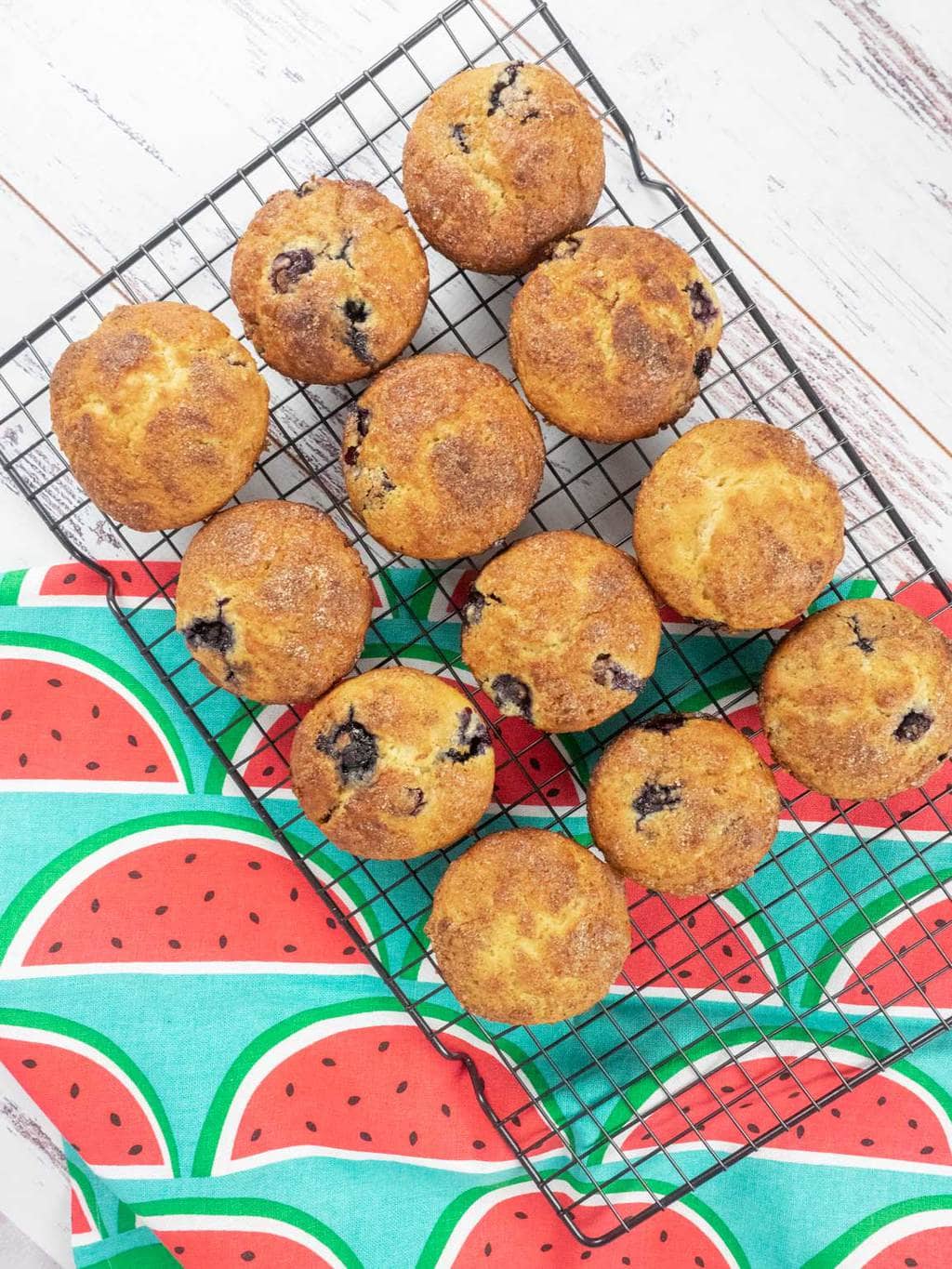 Blueberry and lemon muffins on cooling rack
