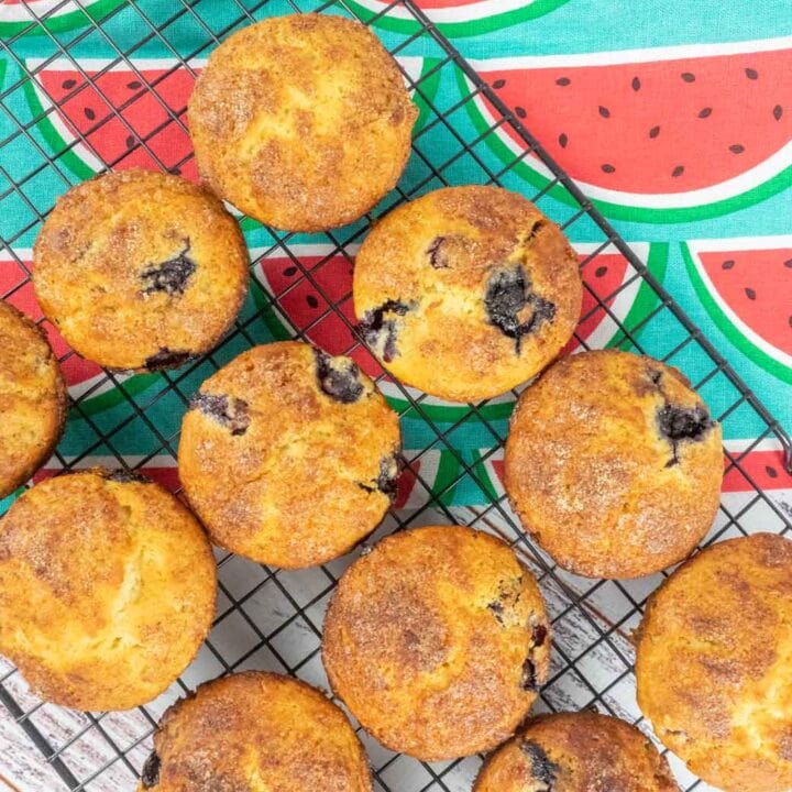 Blueberry muffins with cinnamon crunch on cooling rack