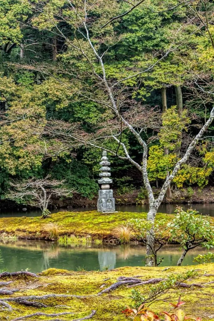 The white snake pagoda in the lake at Kinkakuji in Kyoto