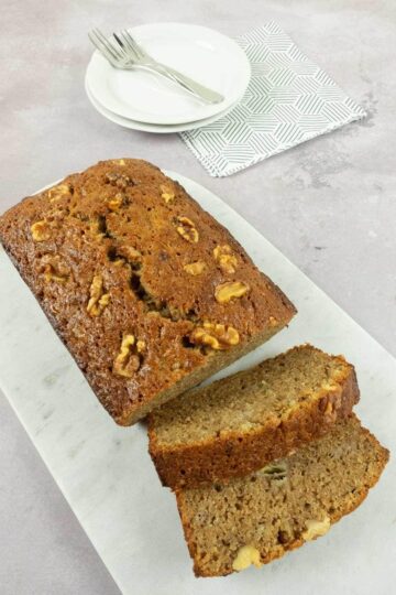 our easy banana loaf cut on marble serving tray