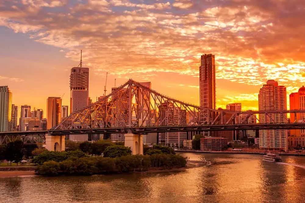 City and sunset behind the Story Bridge in Brisbane