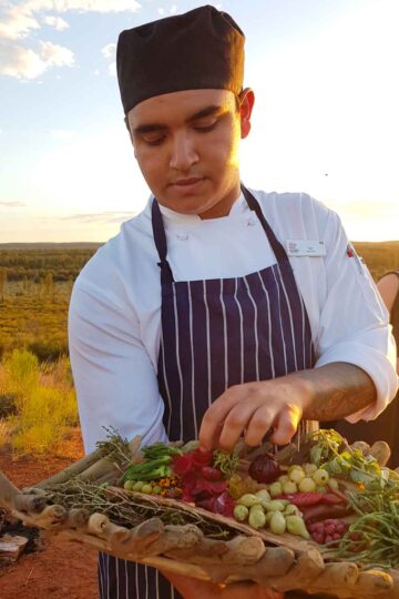 Learning about bush tucker at Tali Wiru dinner in Uluru
