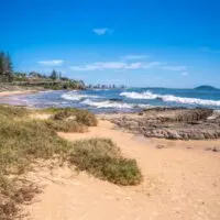 Things to do in Mooloolaba feature image of beach and rocks