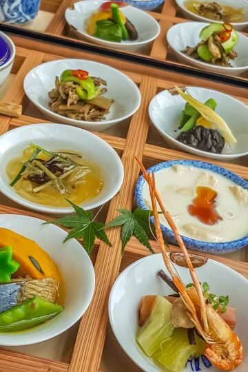 Where to eat in Tokyo feature photo - small dishes of food on wooden table