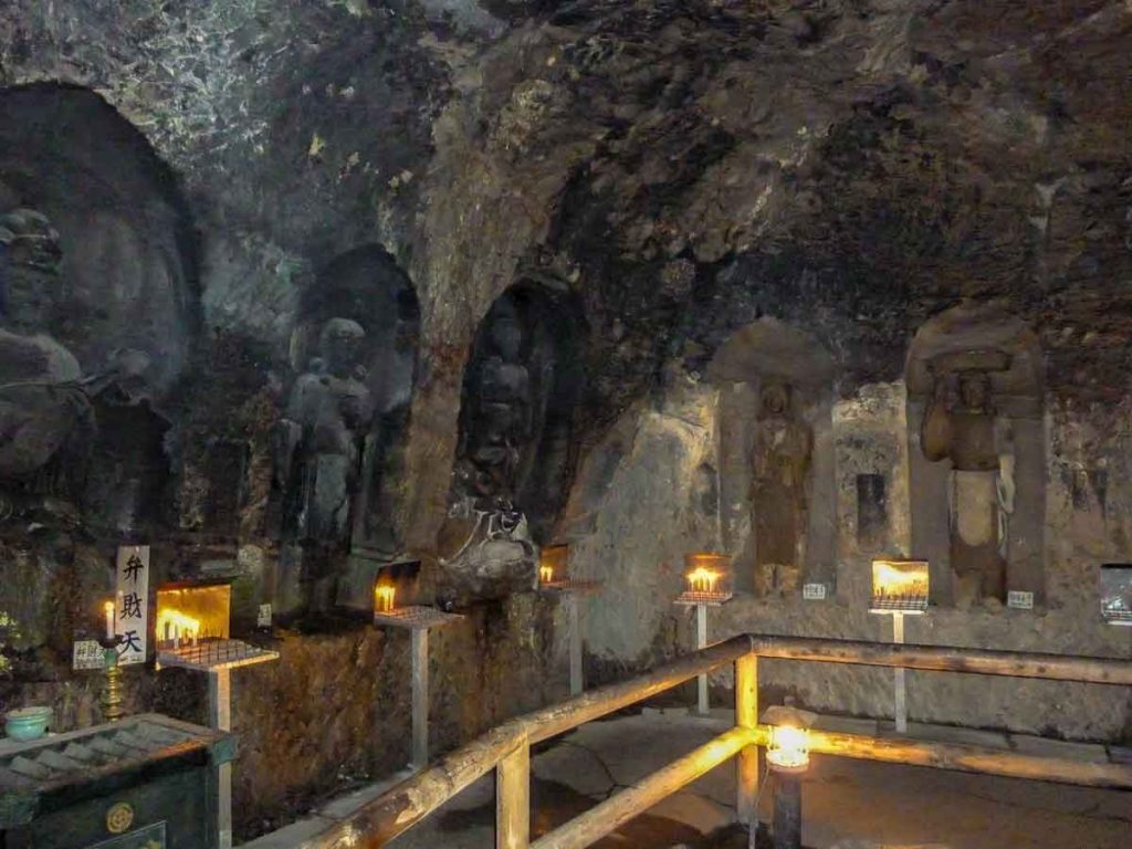 Carvings inside the Benten Kutsu cave at Hasedera Temple