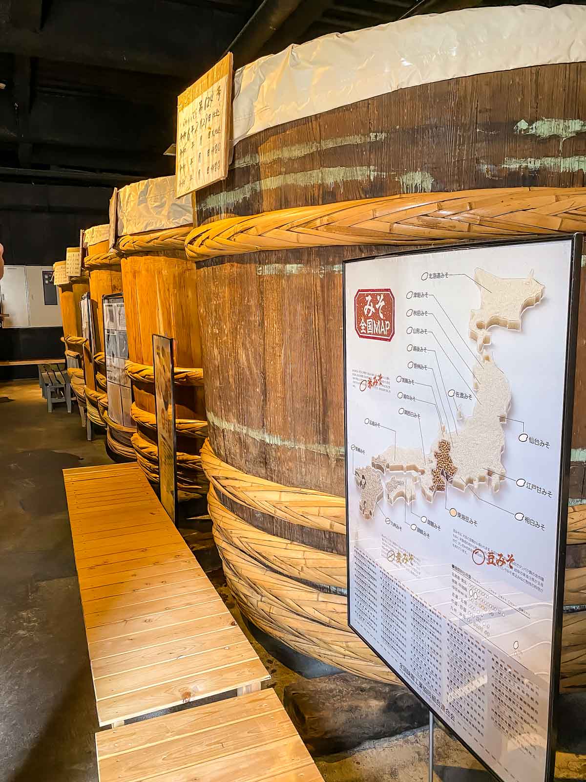 Vats of miso fermenting at Iishi Miso Brewery