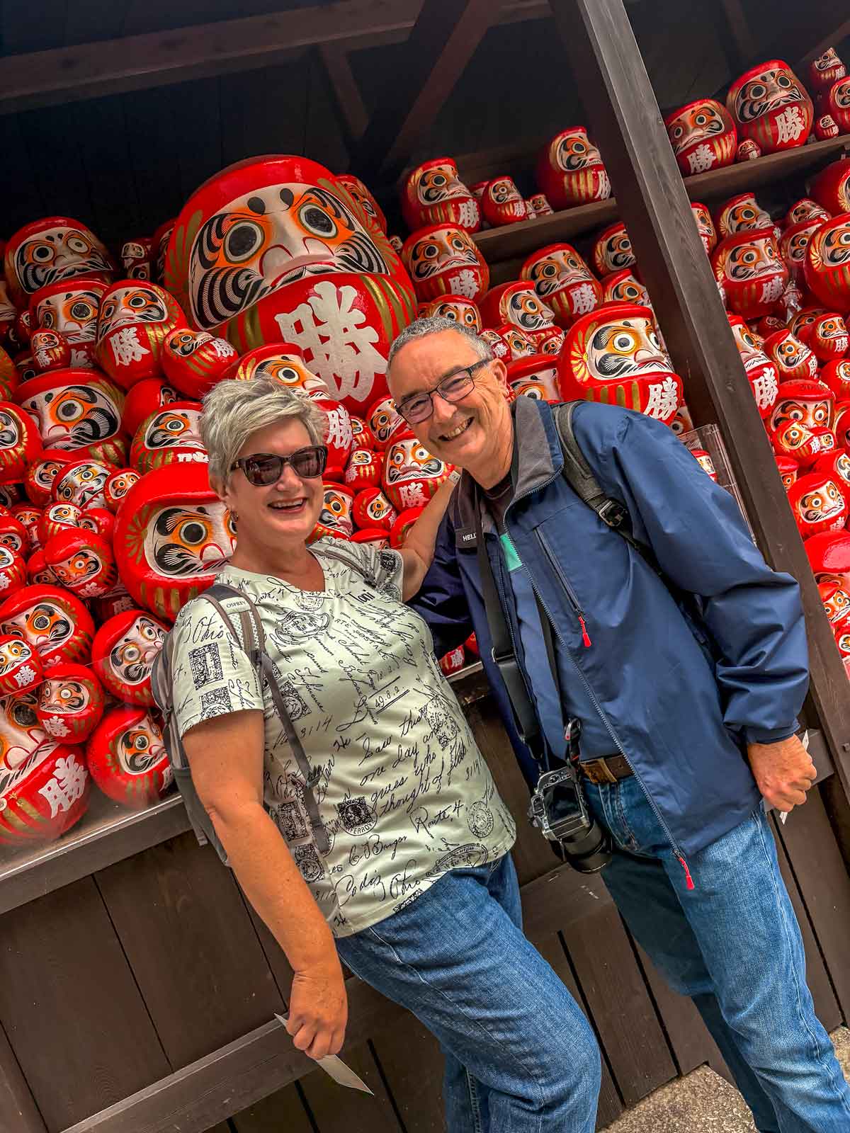 Us in front of the returned daruma at Katsuoji